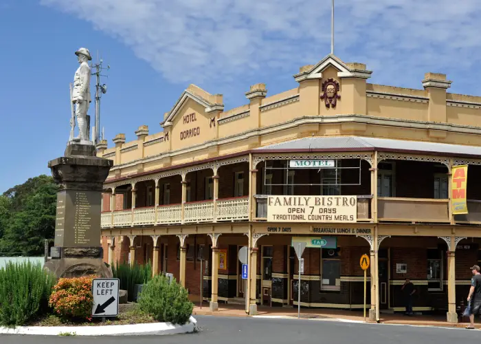 Historic Hotel Dorrigo with war memorial statue in the town centre.